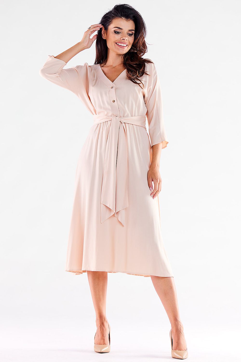 Chic light pink midi dress by Awama, featuring a relaxed silhouette with a belted waist and buttoned front, exuding timeless elegance.