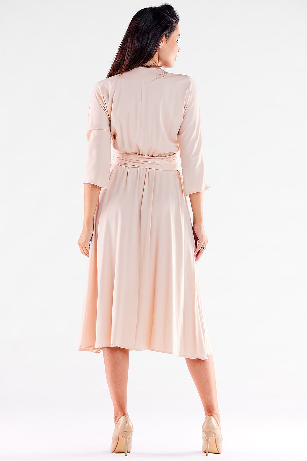 Stylish light pink midi dress by Awama displaying a flattering back view with a belted waist, perfect for a luxurious outing.