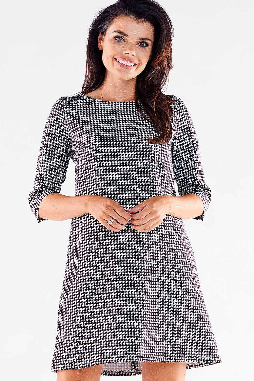 Sophisticated houndstooth mini daydress with 3/4 sleeves from awama, exuding luxury and style with a modern twist.