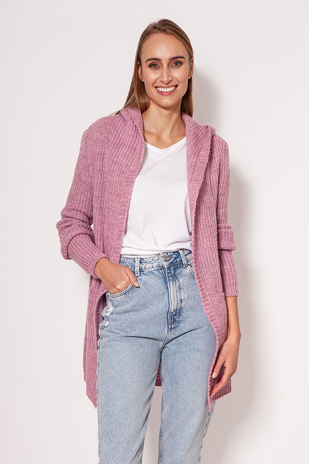 MKM luxurious soft cardigan coat in soft pink, elegantly draped over a stylish white top and high-waisted jeans, reflecting modern luxury and comfort.