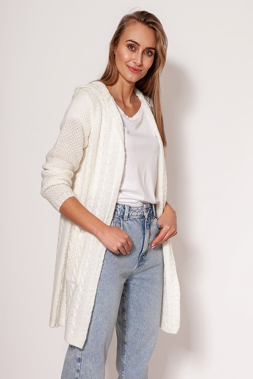 Refined MKM soft cardigan coat in pristine white, exuding a luxurious minimalist charm with dropped shoulders and functional hip pockets, styled beautifully by a model.