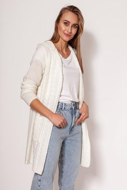 Refined MKM soft cardigan coat in pristine white, exuding a luxurious minimalist charm with dropped shoulders and functional hip pockets, styled beautifully by a model.