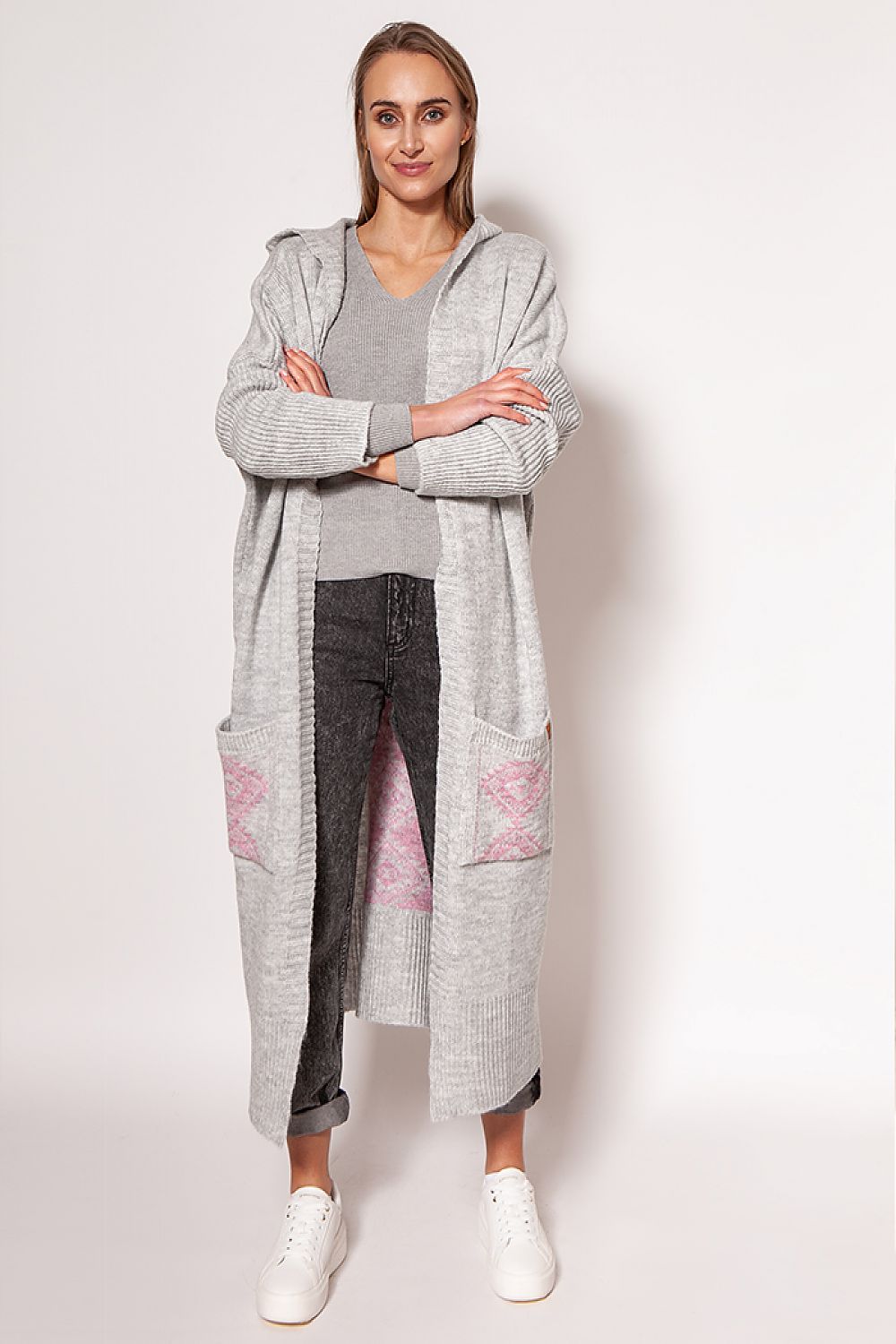 Elegant MKM extended cut cardigan with hood and pockets in grey, showcased on a model, perfect for a sophisticated, luxurious look.