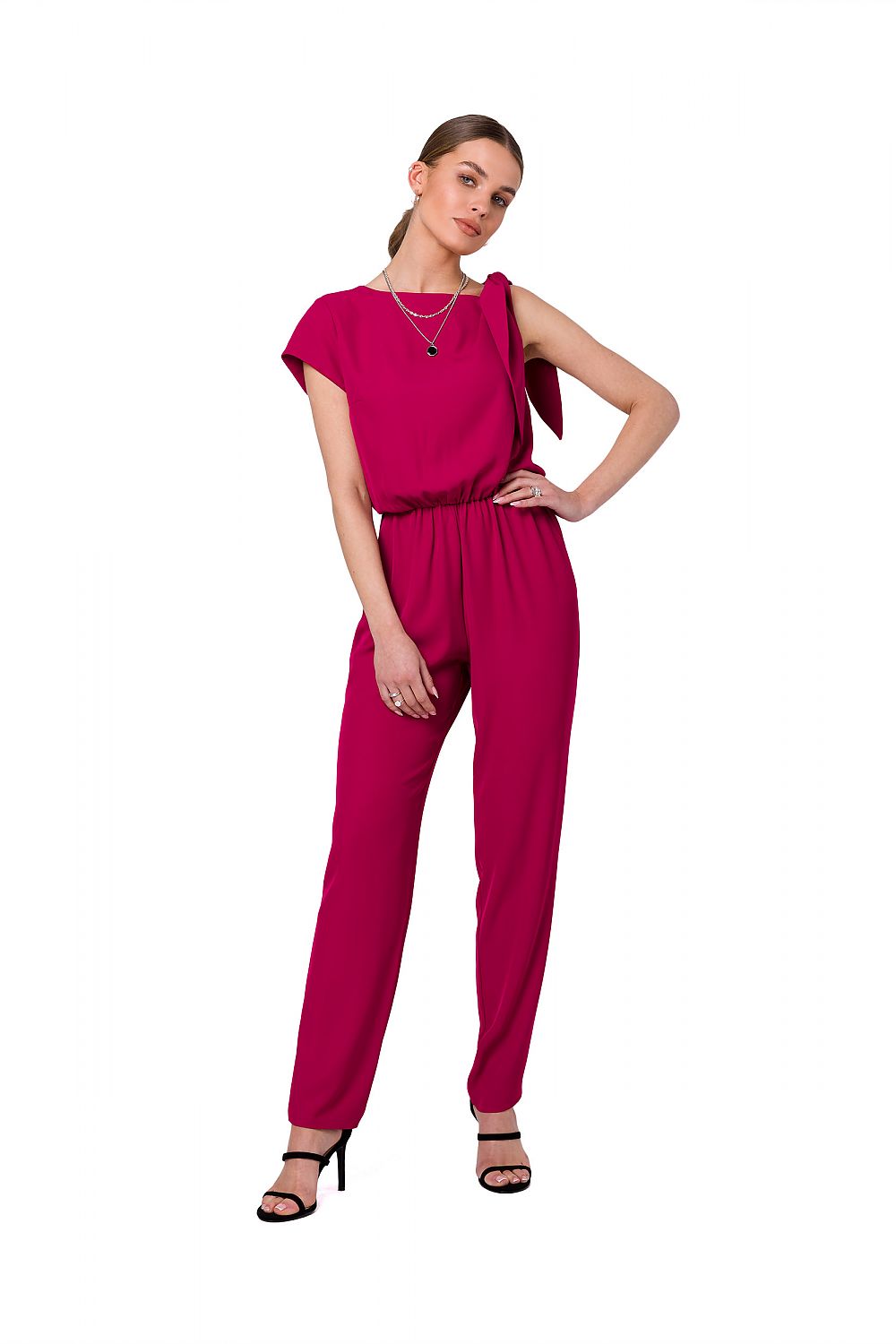 Elegant one-shoulder jumpsuit in vibrant fuchsia by Stylove, featuring tapered legs and an elastic waist, perfect for upscale occasions.