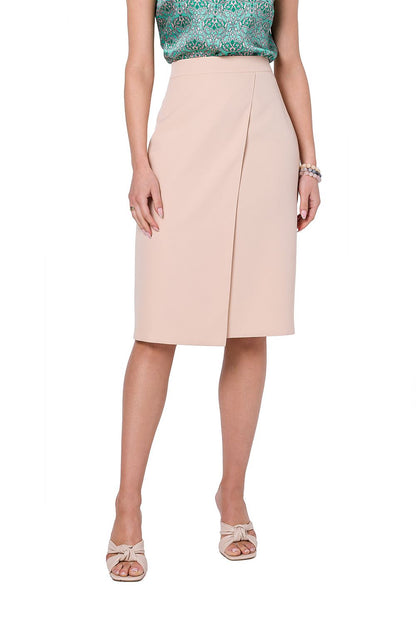 Stylove classic A-line skirt in soft beige, elegantly paired with a vibrant top, accentuating a chic and refined look.