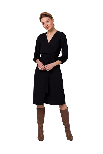 Stylove classic black flared overlap dress with elegant wide sleeves and refined waist binding, a suitable choice for evening elegance.