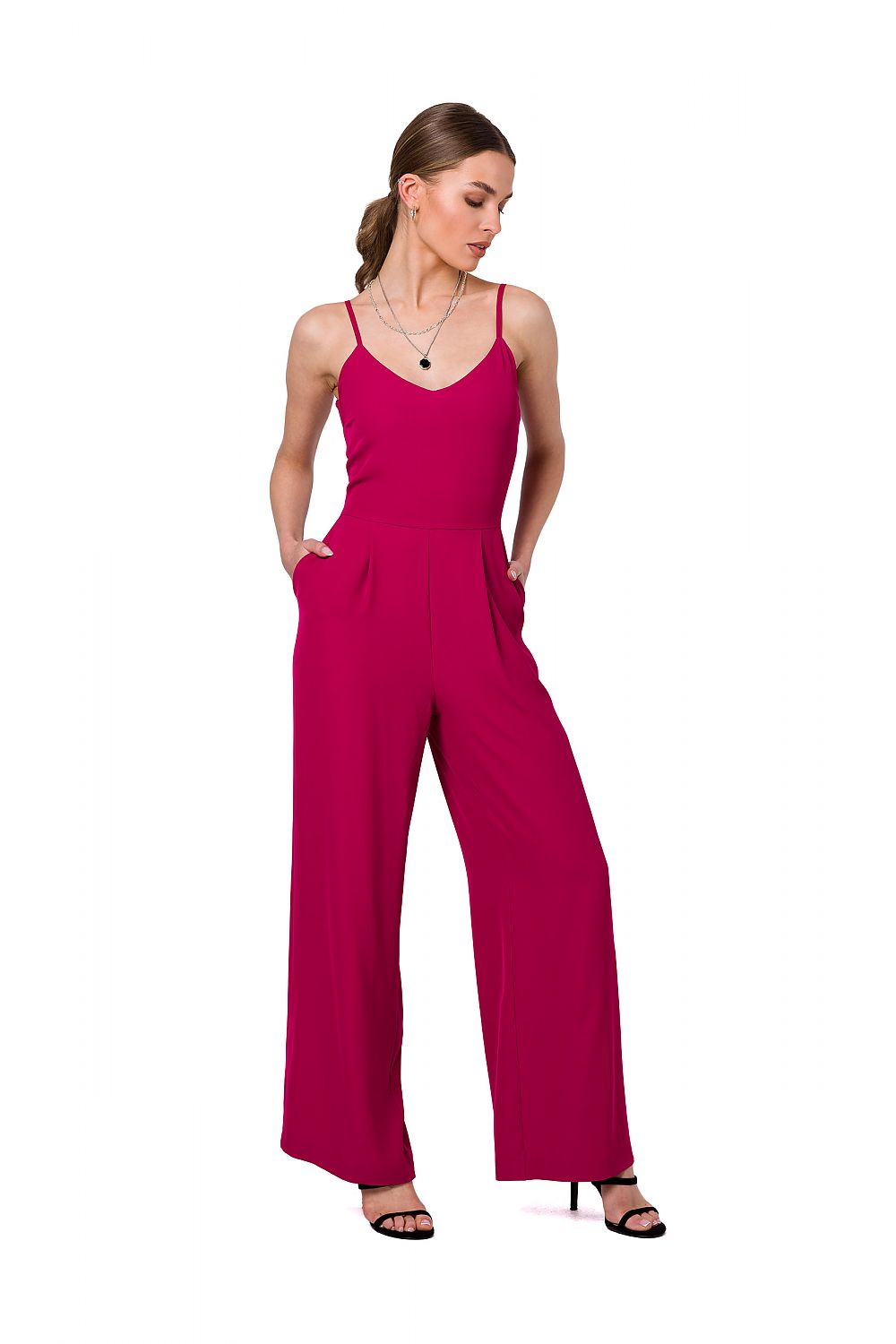 Stylish woman wearing a fuchsia Elegant Adjustable Straps One-Piece Suit with Slip Pockets by Stylove, showcasing its chic design for office and dinner occasions.