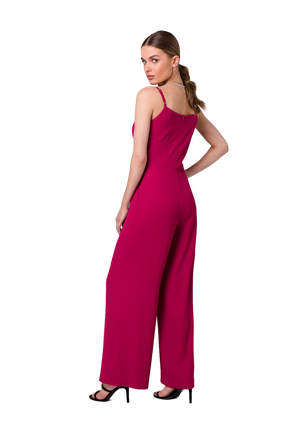 Sophisticated rear view of a woman in a fuchsia Elegant Adjustable Straps One-Piece Suit with Slip Pockets by Stylove, highlighting the elegant cut and sleek silhouette.