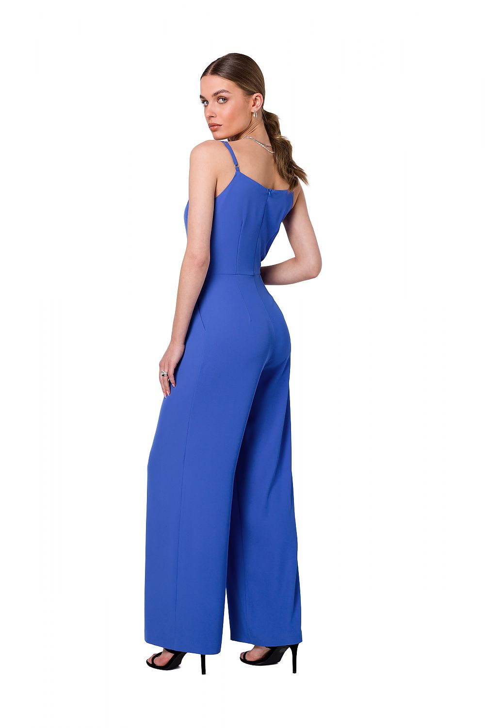 Back view of a luxurious blue one-piece suit featuring adjustable thin straps and flattering wide-leg design, ideal for chic evening wear, by Stylove.