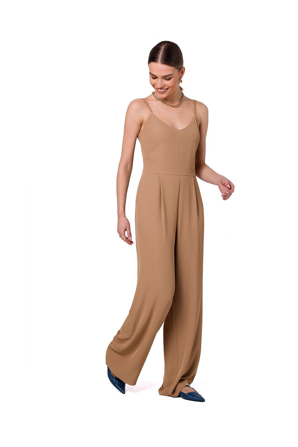 Stylove elegant one-piece suit in a warm beige shade featuring adjustable straps and a flowing silhouette, ideal for both office and dinner settings.