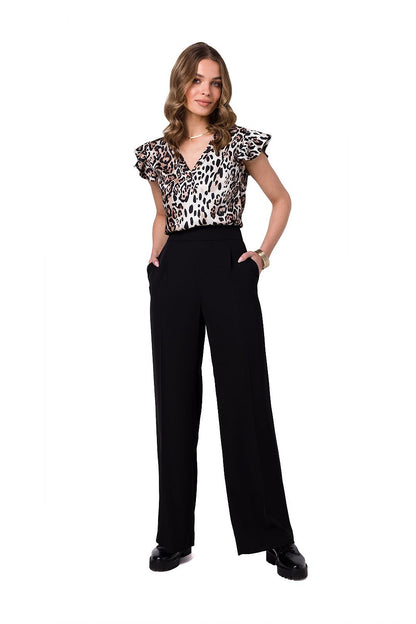 Sophisticated black wide leg trousers by Stylove, paired with a fashionable animal print blouse, epitomising modern luxury and elegance.