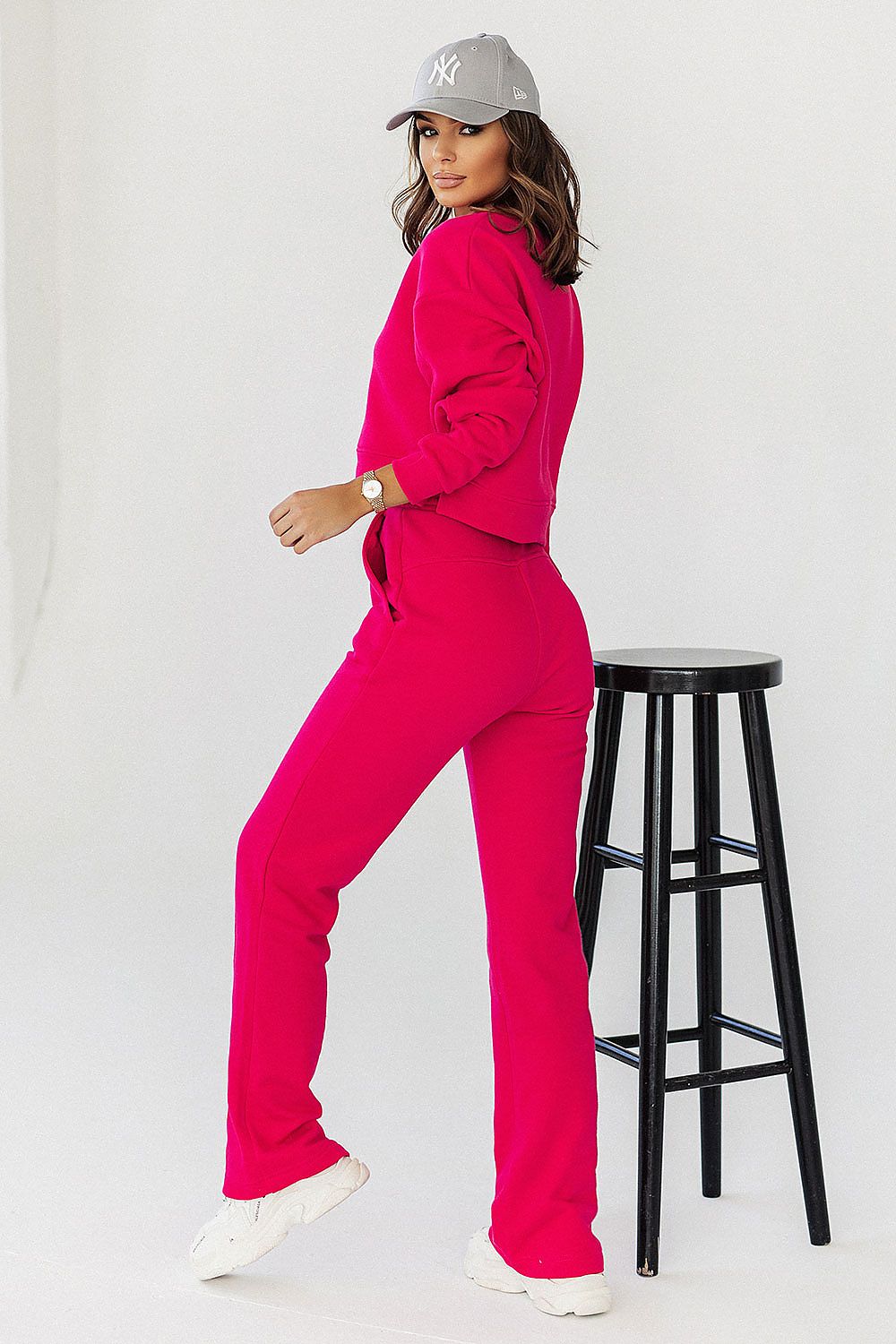 Fashion-forward pink sweatpants from IVON, showcasing a sleek fit and modern design, perfect for elevating casual elegance.