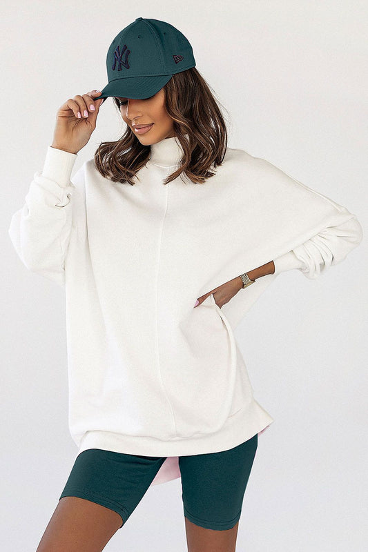 Elegant ensemble featuring IVON Women's Cycling Shorts in teal paired with a luxurious white sweatshirt and a matching cap, exuding effortless style.