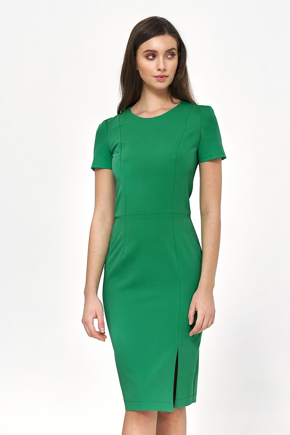 Elegant green minimalist daydress by Nife, featuring a sophisticated waist-cut design, perfect for office and evening wear, displayed on a model against a clean backdrop.