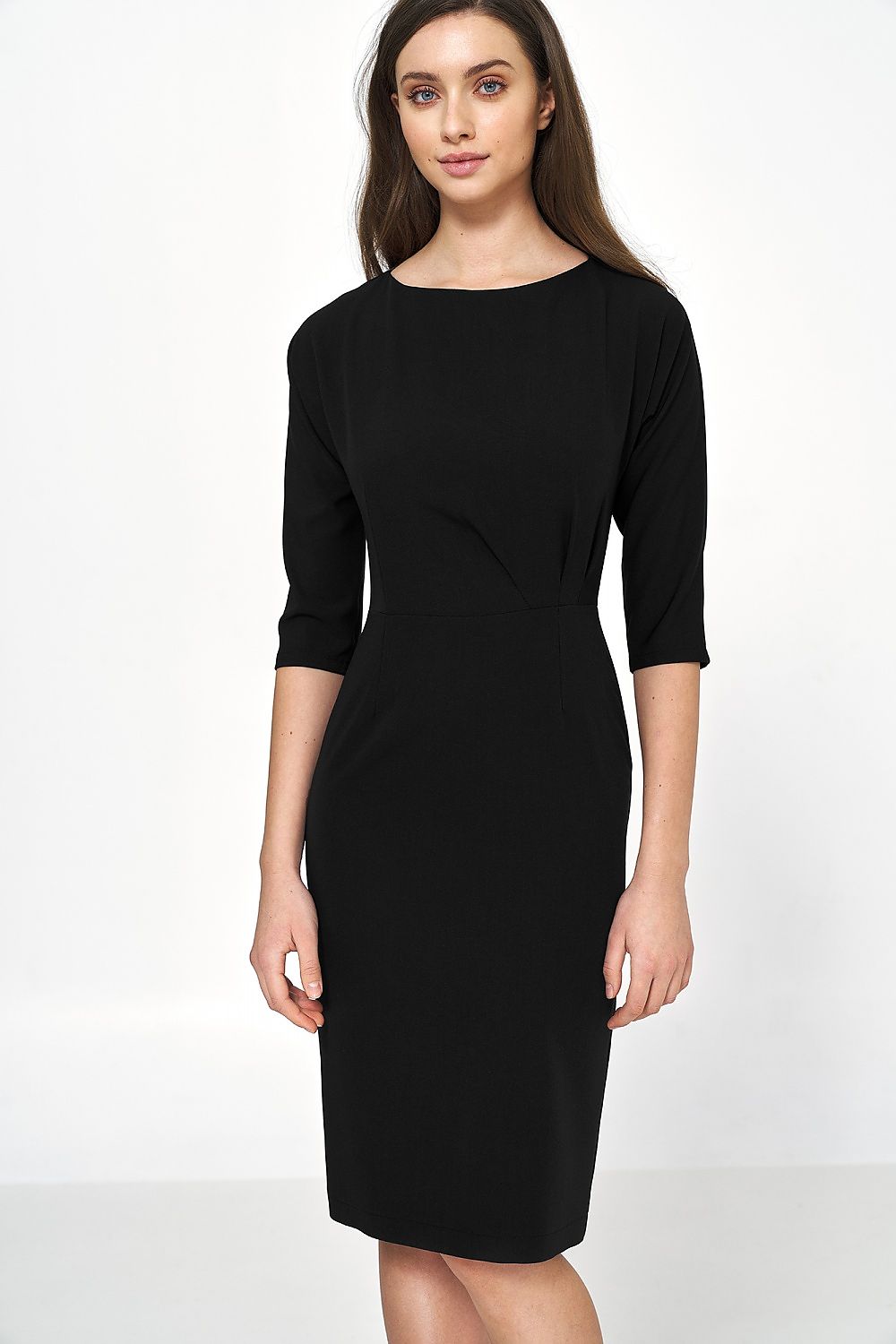 Elegant black dress featuring asymmetrical draping and 3/4 sleeves, styled by Nife. Perfect for sophisticated office wear with a flattering boat neckline.