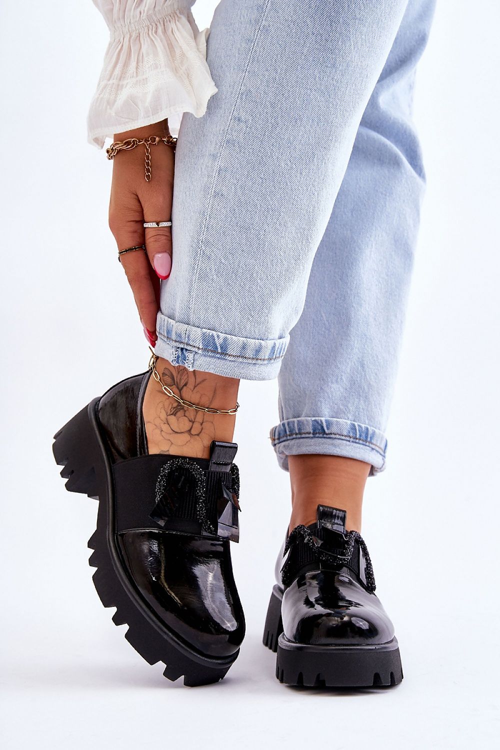 Stylish elegant slip-on heeled half shoes by Step in Style, crafted in eco leather, showcased alongside fashionable denim. Features a 5cm chunky heel and 3cm platform for contemporary comfort and style.