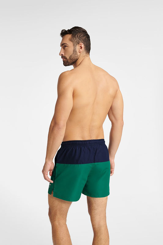 Elegant back view of Henderson Men's GEM swim trunks, featuring a modern navy blue and green colour scheme, designed for both style and functionality.