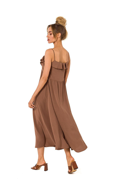 Back view of Moe's loose-fitting midi dress in brown, featuring a decorative ruffled neckline and a stylish flared cut.