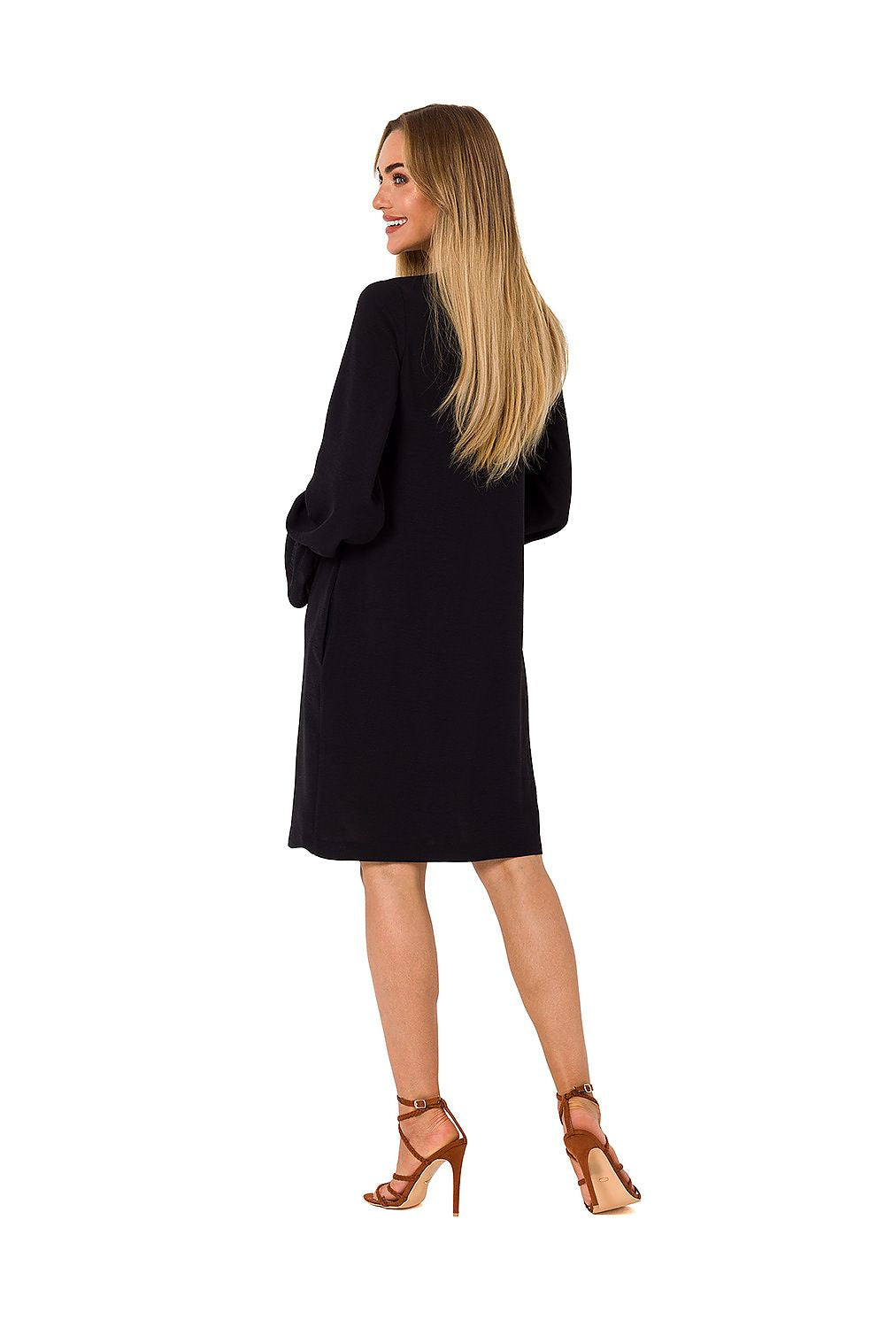 Elegant view of a black long sleeve dress by Moe, highlighting the back detail and luxurious fabric, suitable for upscale events.