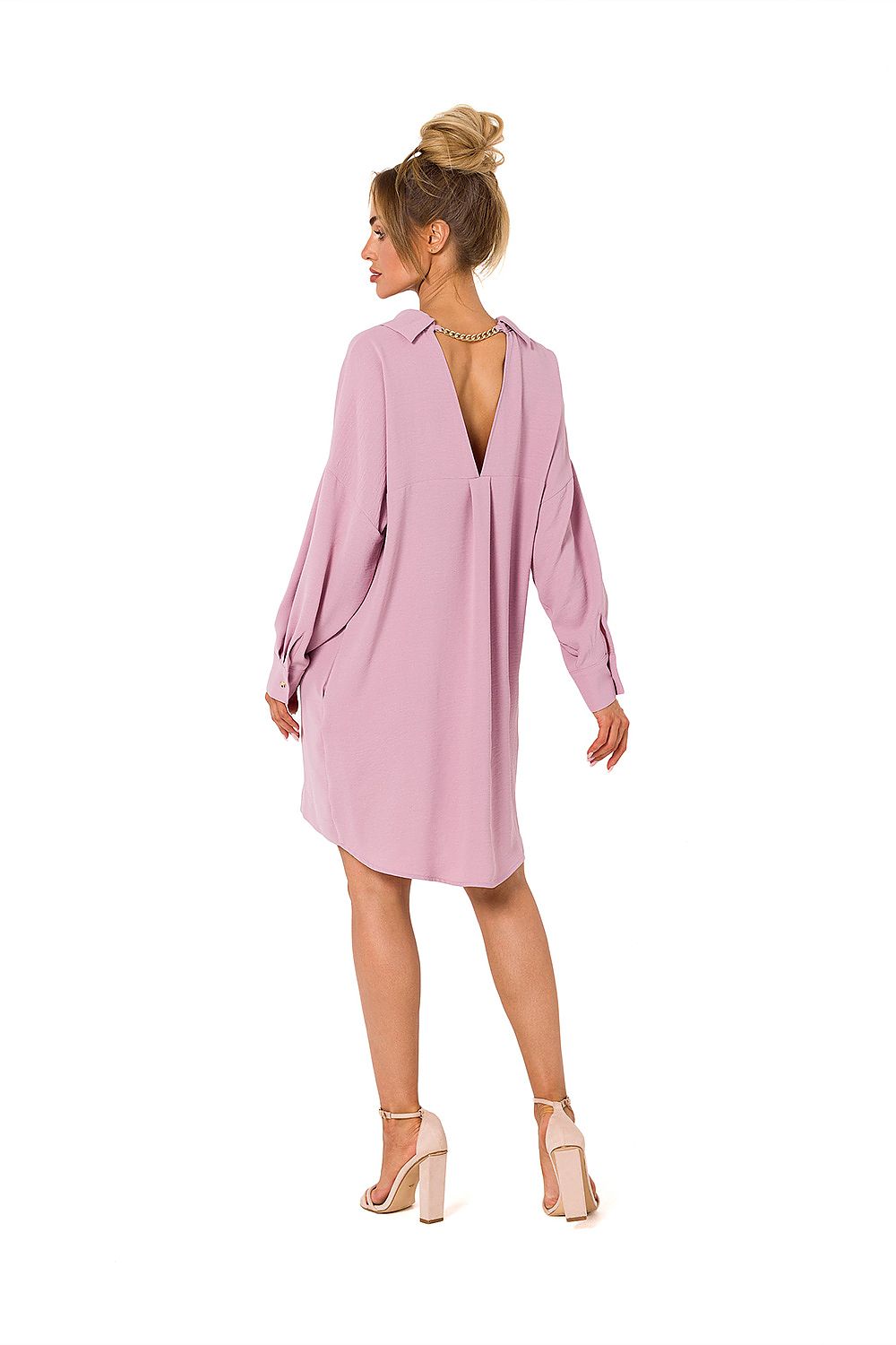 Back view of Moe's luxury daydress, showcasing a sophisticated chain detail along the neckline and a stylish V-back design.