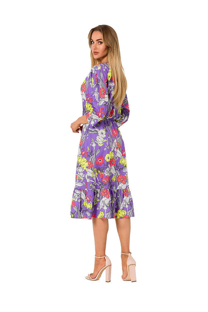 Stylish back view of the purple floral midi dress by Moe, showcasing its flowing ruffles and elegant silhouette, ideal for summer gatherings and events.