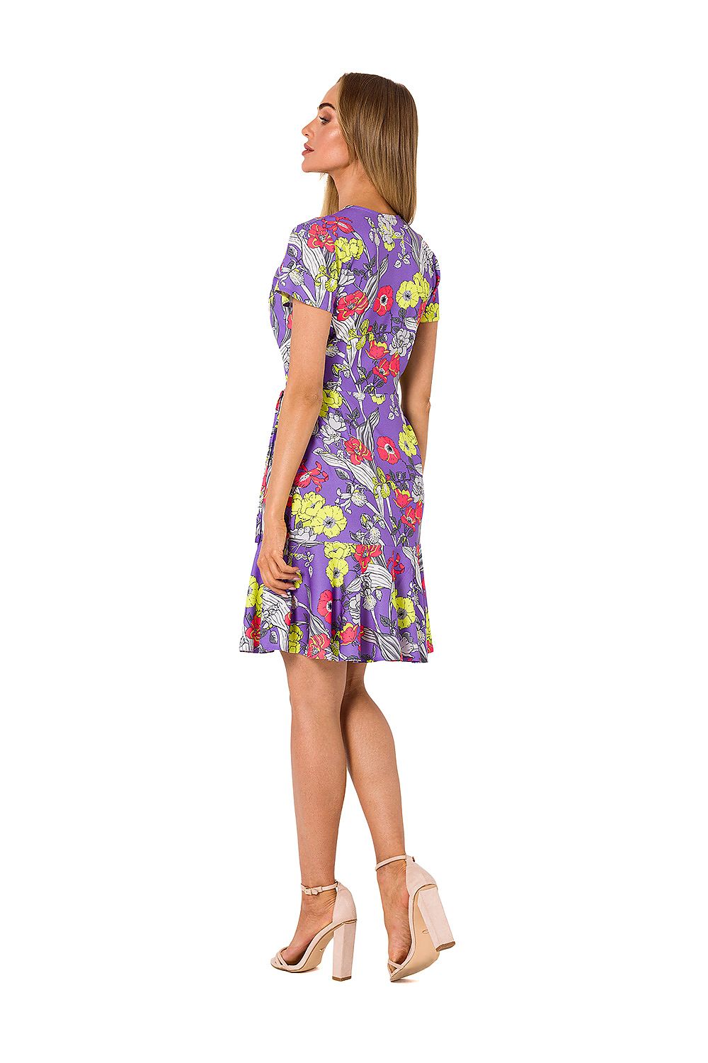 Back view of Moe's elegant floral summer dress, showcasing its luxurious design with a ruffle hem and side tie, perfect for chic summer outings.