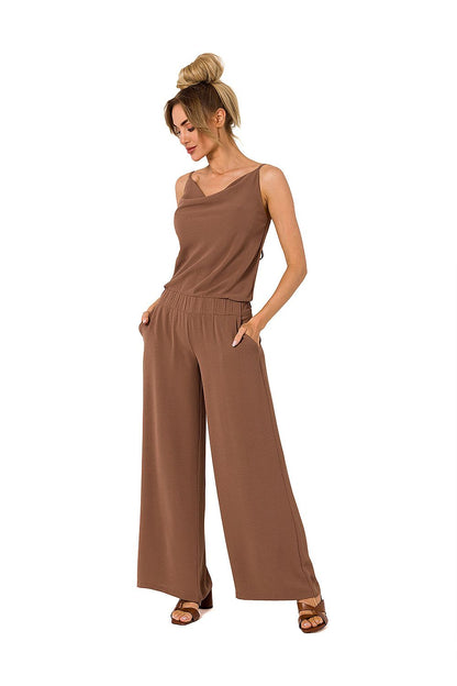Elegant draped neckline pantsuit by Moe, showcasing thin straps and slip pockets, styled in a sophisticated brown colour.
