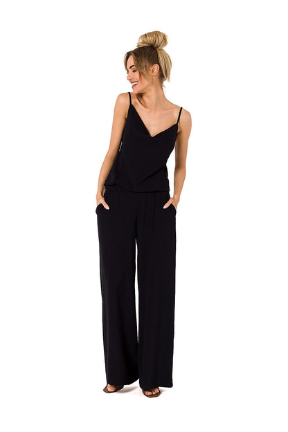 Chic black draped neckline pantsuit by Moe, with thin straps and a relaxed fit, perfect for elegant occasions.