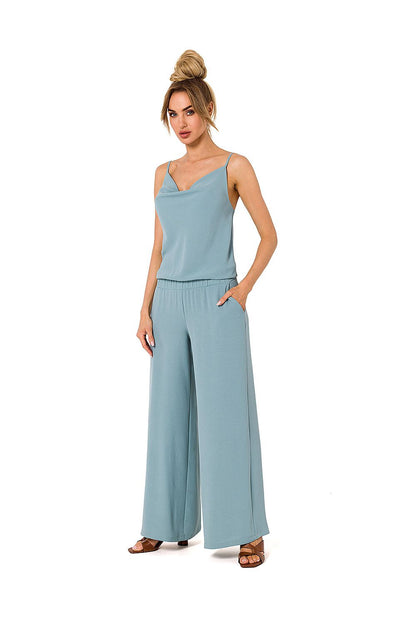 Trendy light blue draped neckline pantsuit featuring wide legs and thin straps, crafted by Moe for a luxurious flair.