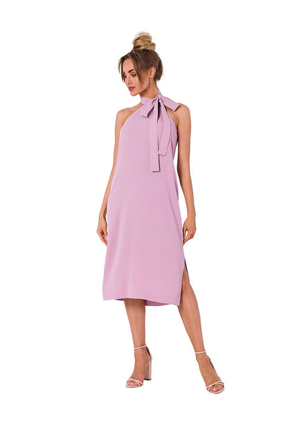 Elegant halter neck crepe daydress by Moe, featuring a stylish design with a bow tie detail, perfect for day or evening occasions.