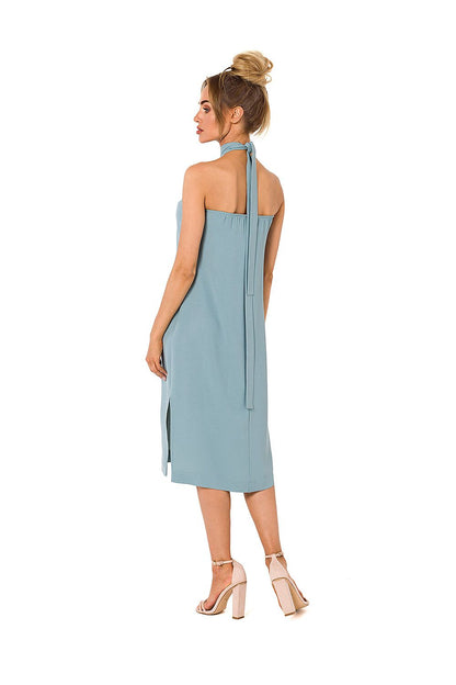 Sophisticated back view of a soft blue halter neck crepe daydress by Moe, highlighting its elegant design and open back details.