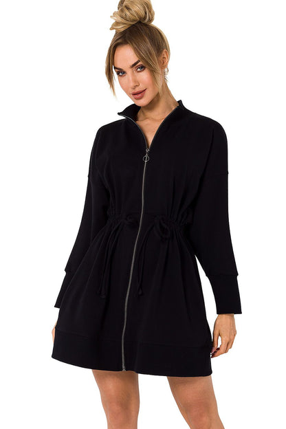 Luxurious black zippered daydress with a cinched waist and modern design, showcasing the elegance of Moe's collection.
