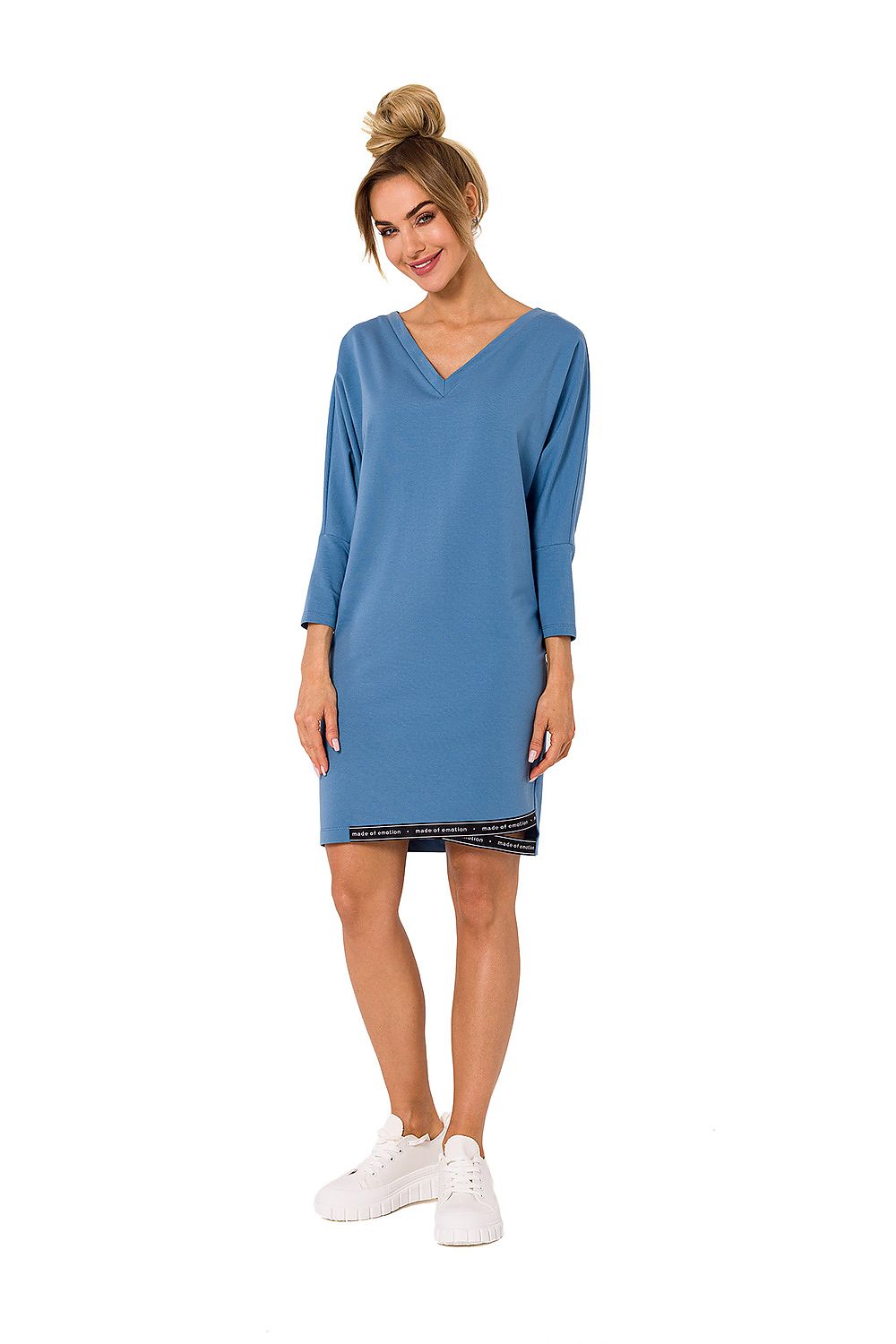 Elegant kimono sleeve daydress in blue, featuring a flattering V neckline and logo piping, worn casually with white sneakers, by Moe Fashion.