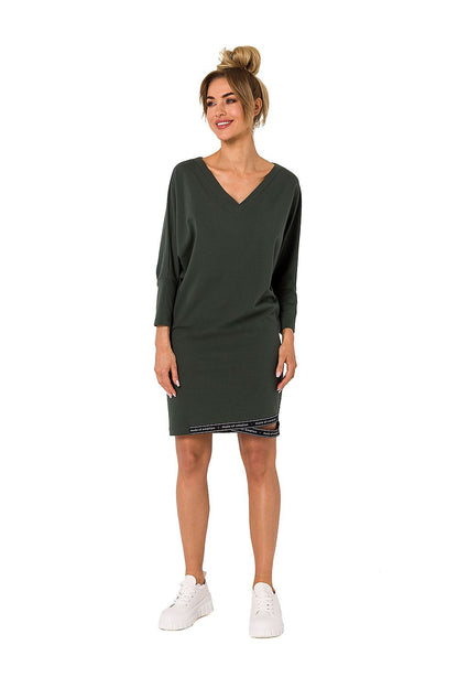 Elegant kimono sleeve daydress with V neckline from Moe, styled with logo piping, showcased on a model.