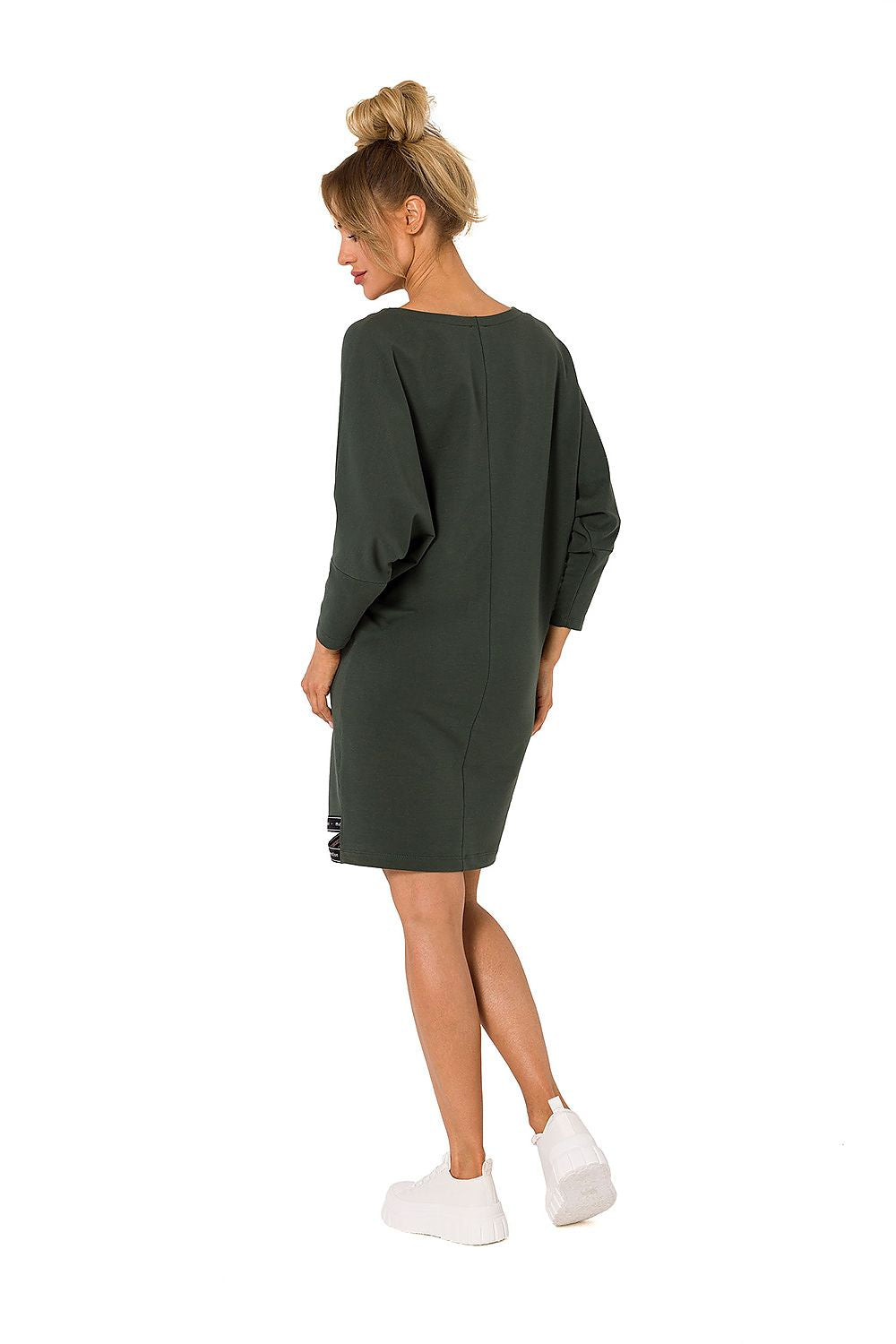 Back view of the sophisticated kimono sleeve daydress by Moe, featuring a comfortable design and logo detailing.
