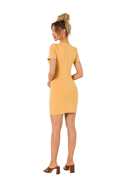 Back view of Moe mini cotton dress in soft yellow, showcasing the sleek silhouette and delicate detailing, ideal for a chic summer look.