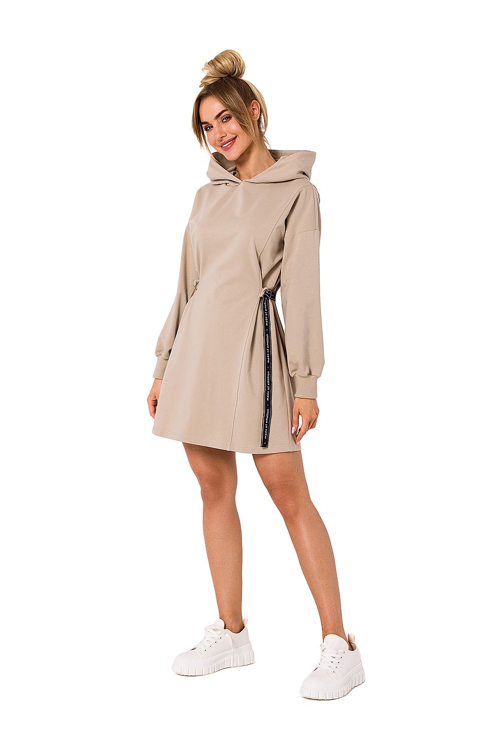 Moe luxury cotton-blend mini dress with hood and long sleeves, featured in a stylish beige colour, paired with white sneakers for a chic look.