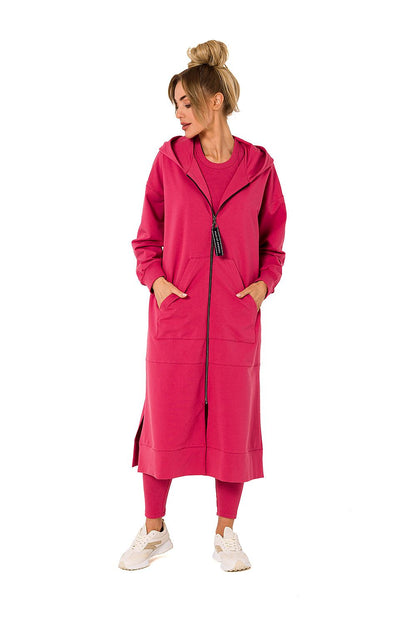 Elegant pink hooded sweatshirt by Moe, featuring a zippered design and front pockets, styled with matching leggings for a chic, coordinated look.