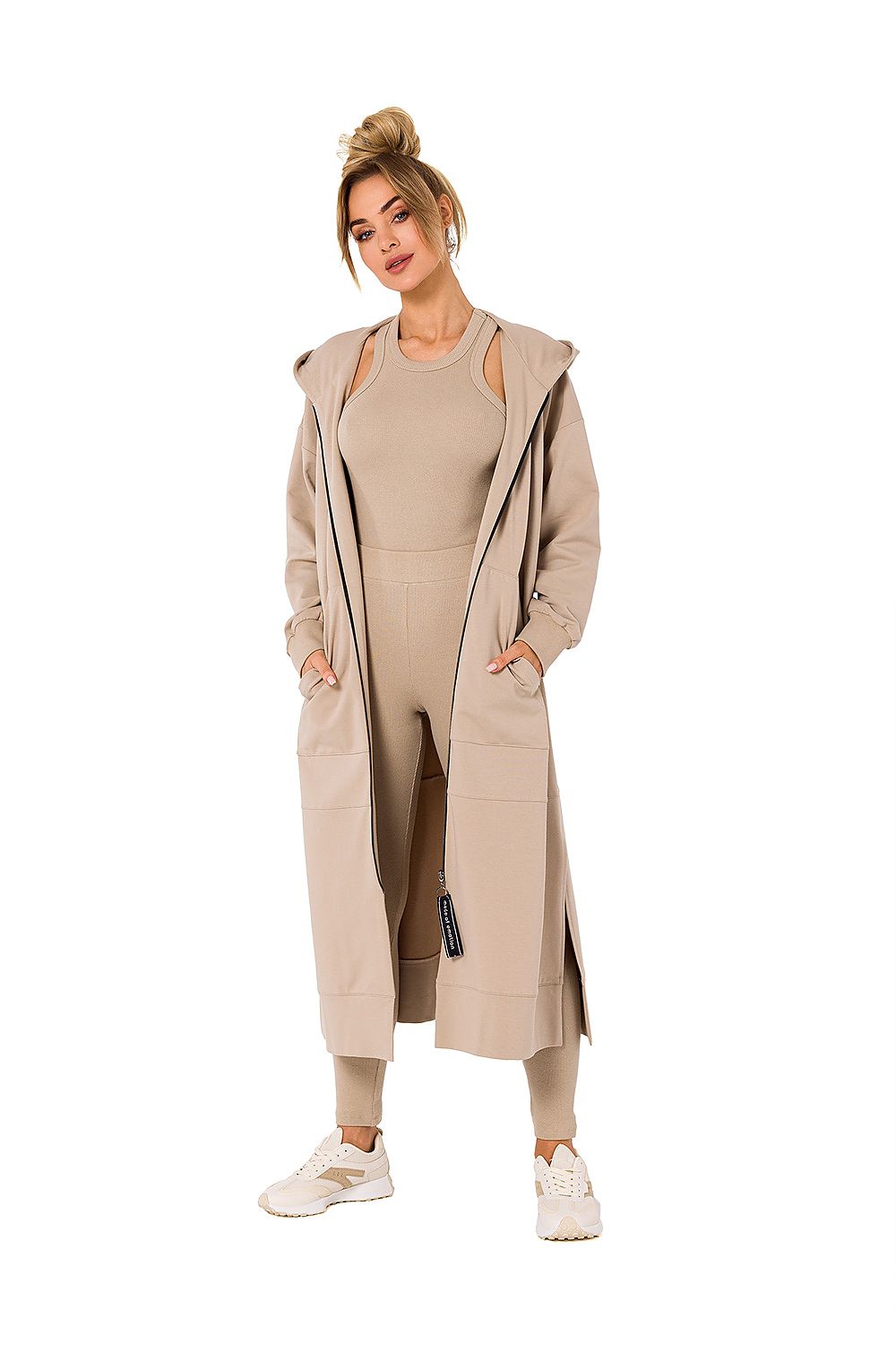 Luxurious hooded sweatshirt by Moe in elegant beige, showcasing a stylish and comfortable fit, perfect for cold days, featuring pockets.