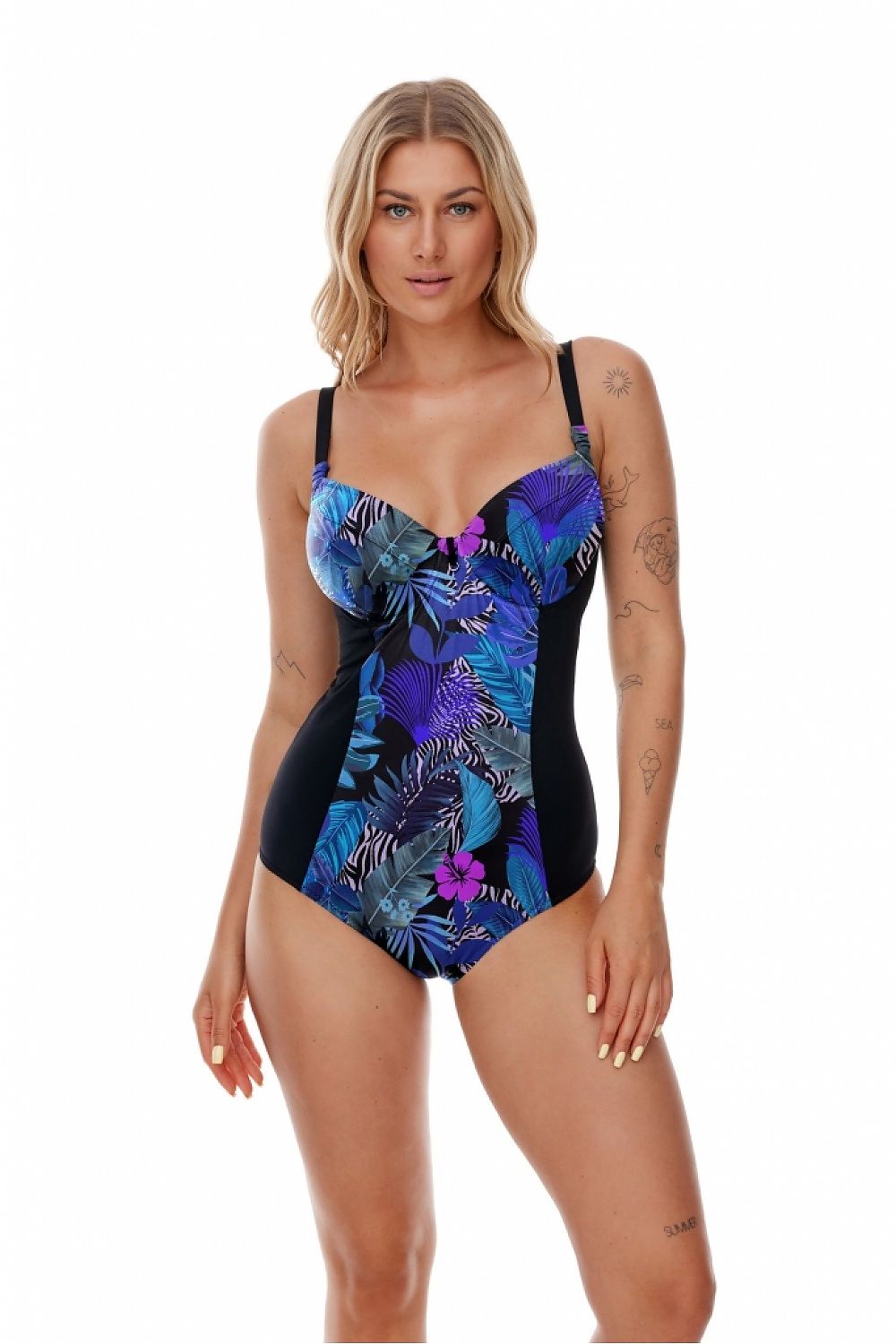 Elegant one-piece swimsuit by Lupo Line featuring a vibrant floral motif and adjustable straps, tailored for fuller shapes. Perfect for beach or poolside elegance.