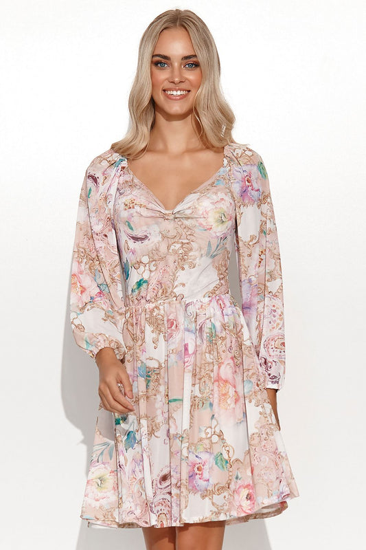 Elegant Makadamia daydress featuring a girly cut with long puffed sleeves, intricate floral patterns, and a bow detail at the neckline, perfect for chic summer outings.