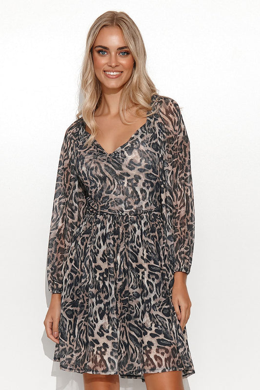 Model showcasing Makadamia Airy Girly Daydress with High-Cut Neckline and patterned mesh, featuring a stylish leopard print and elegant long sleeves.