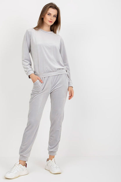 Luxurious grey velour set by Rue Paris featuring a stylish blouse and elegant long pants with elastic waistband, perfect for a chic loungewear ensemble.