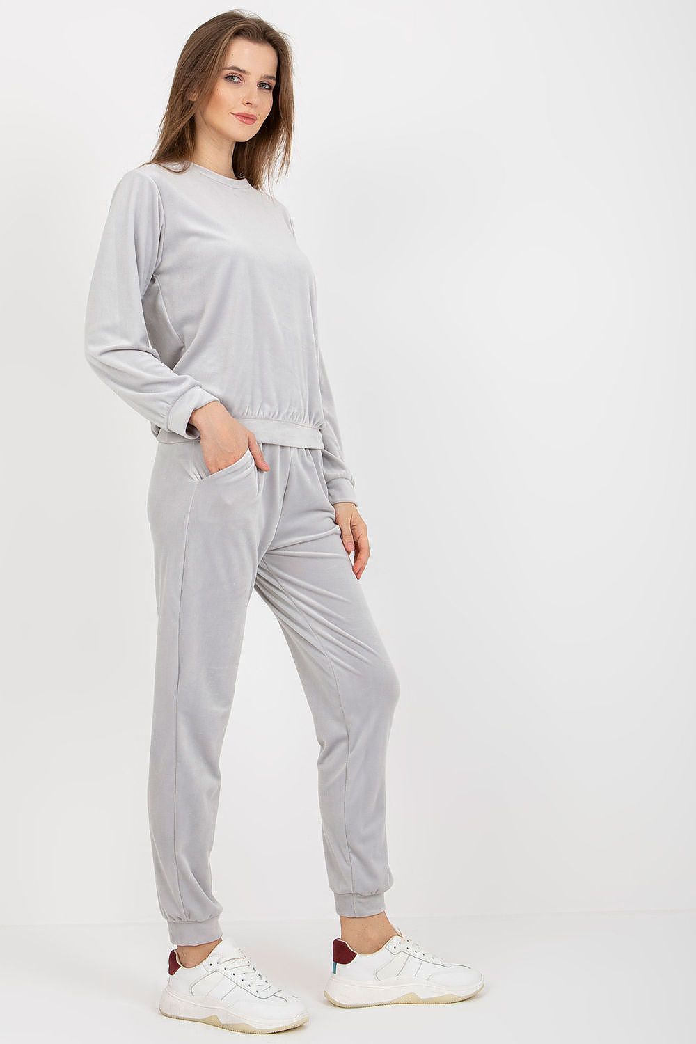 Chic grey velour lounge set by Rue Paris, showcasing a sophisticated blouse paired with comfortable long pants, ideal for stylish relaxation.