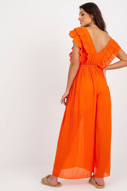 Chic back view of the Och Bella wide leg jumpsuit in vibrant orange, showcasing its pleated design and flattering waist tie, ideal for sophisticated summer events.