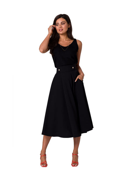 Elegant flared midi skirt with high waist and decorative buttons from BeWear, styled with a black top and red heels, showcasing a sophisticated look.