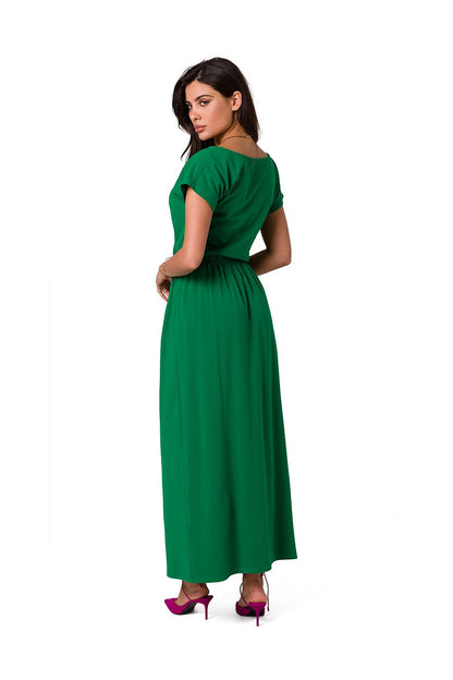 BeWear luxury cotton maxi dress in vibrant green, featuring an asymmetrical neckline and elegant elastic waistband, showcased from the back.