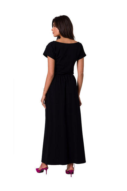 BeWear sophisticated cotton maxi dress in classic black, displayed from the back with a stylish asymmetrical neckline.