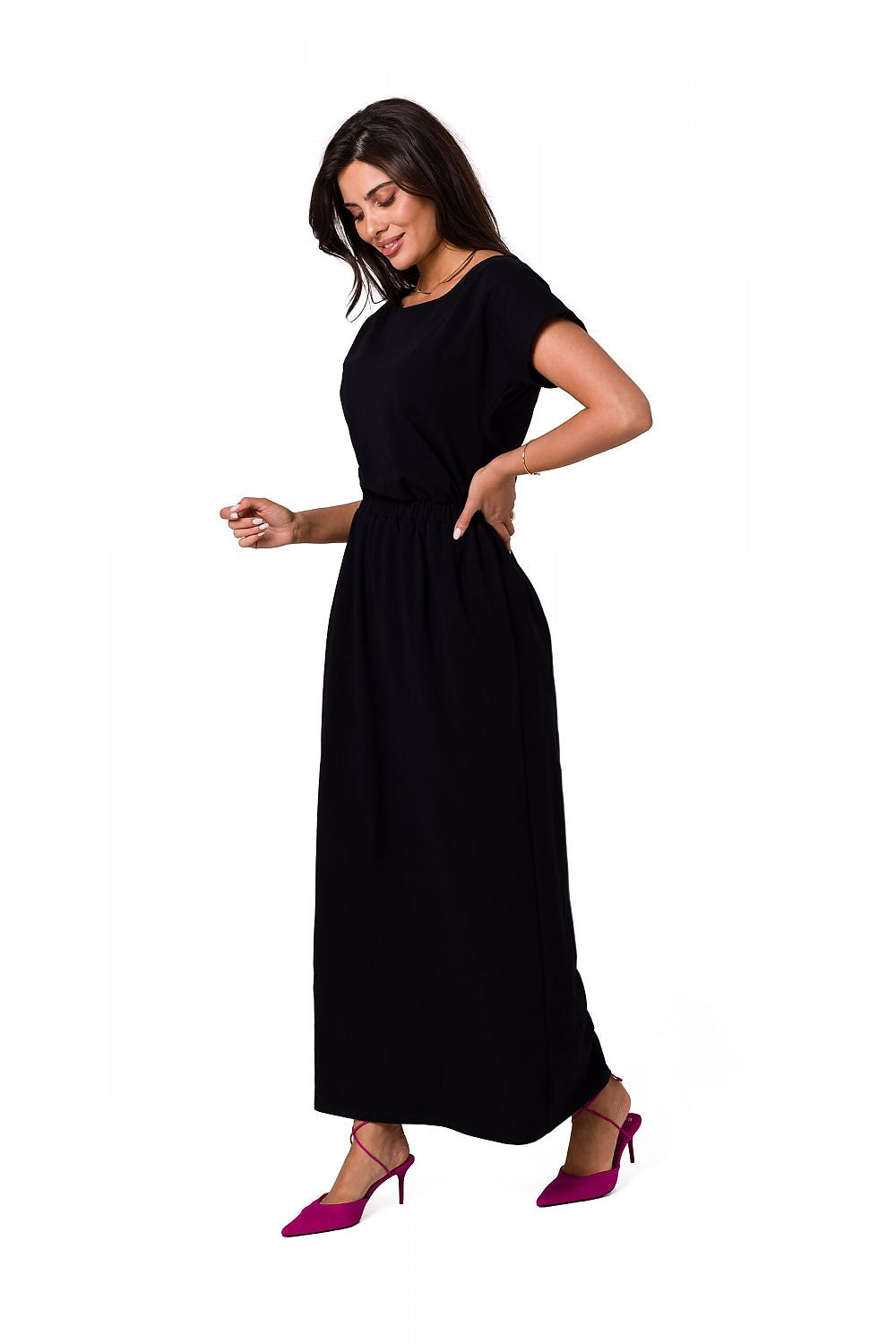 BeWear elegant cotton maxi dress in timeless black, presented from the front with an asymmetrical neckline and an elastic waistband.