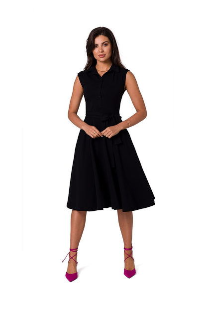 Stylish sleeveless daydress with a classic collar and flared skirt in timeless black, great for various occasions, by BeWear.